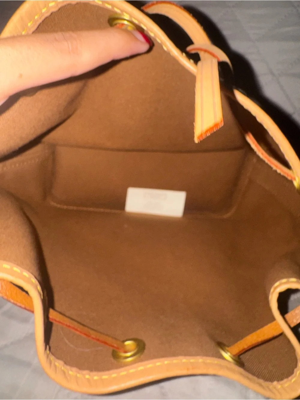 Louis Vuitton Monogram Canvas Drawstring Shoulder Bag in Brown and Tan